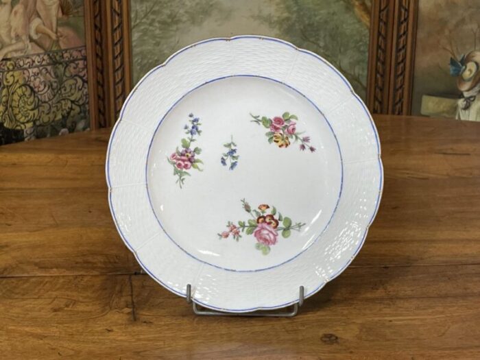 18th century porcelain plate with polychrome flowers from sevres 1