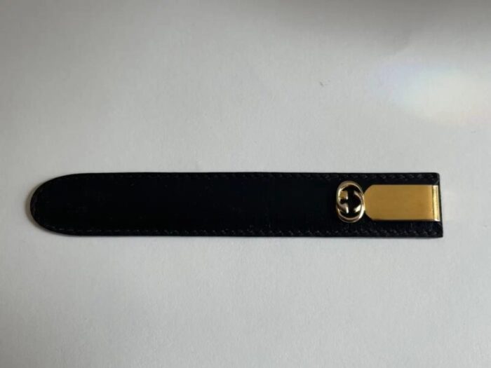 1970s gucci gold metal letter opener in black leather case 1380