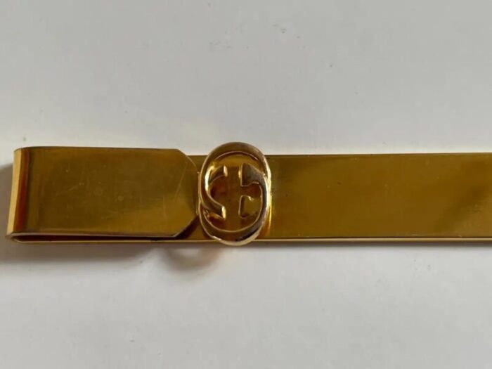 1970s gucci gold metal letter opener in black leather case 1423