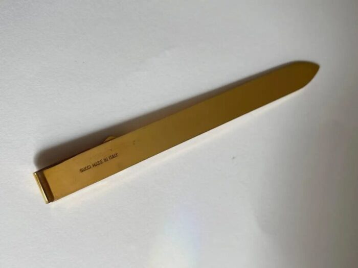 1970s gucci gold metal letter opener in black leather case 3931