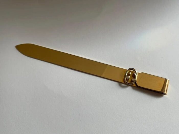 1970s gucci gold metal letter opener in black leather case 9099