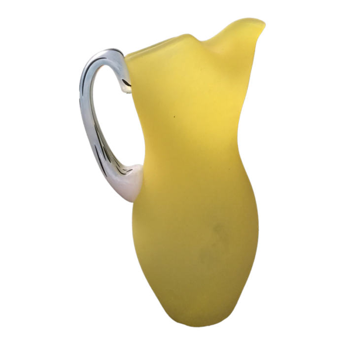 1990s kosta boda yellow art glass pitcher with white and black handle designed by gunnel sahlin 8399