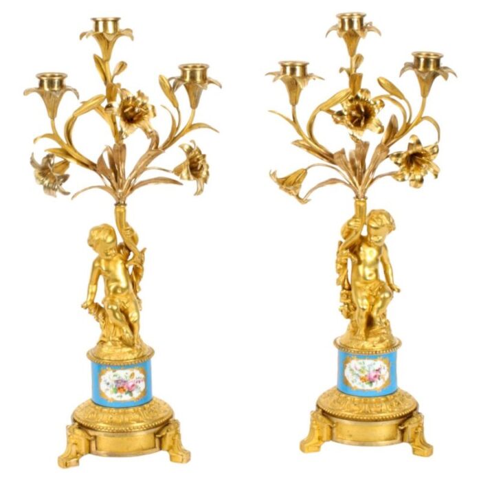 19th century blue celeste porcelain ormolu candleholders from sevres set of 2 1