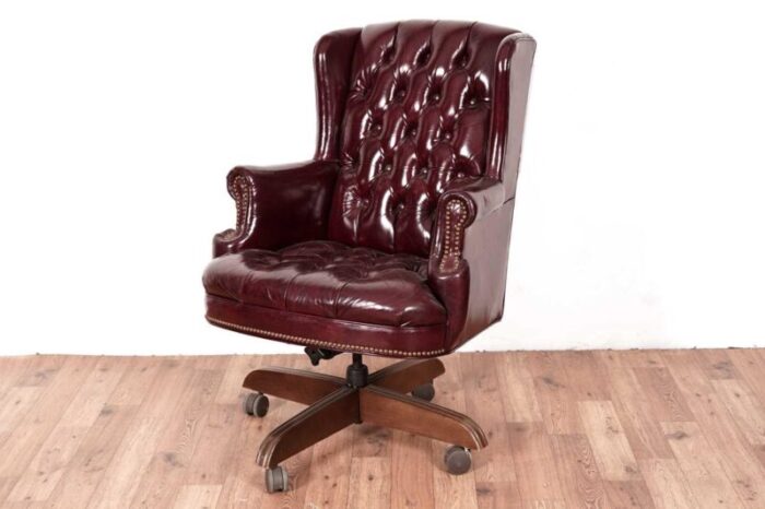 20th century button back chesterfield revolving desk chair with polished burgundy red leather upholstery with tilt action 1970s 5939