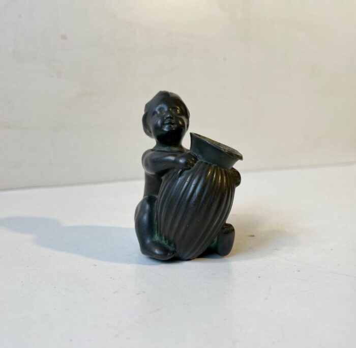 art deco baby girl figurine with pen holder from just andersen 1930s 2