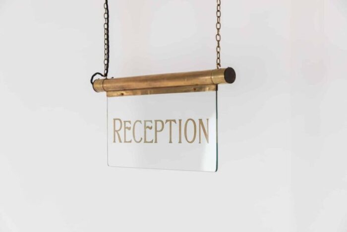 art deco reception illuminated sign in brass 1