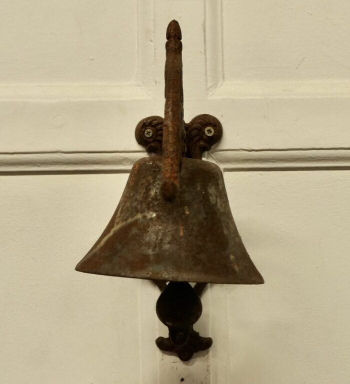 cast iron out door bell on bracket 1920s 4