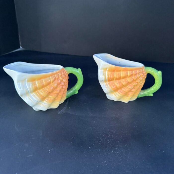 ceramic shell majolica creamers a pair 8571