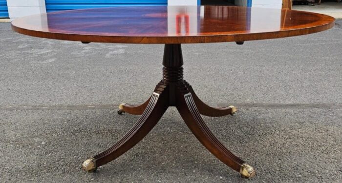 early 20th century restall brown and clennell round dining table 1916