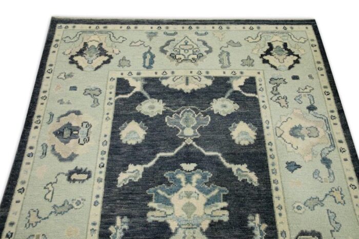 early 21st century charcoal and blue floral design handwoven wool turkish oushak rug 411 x 610 2856