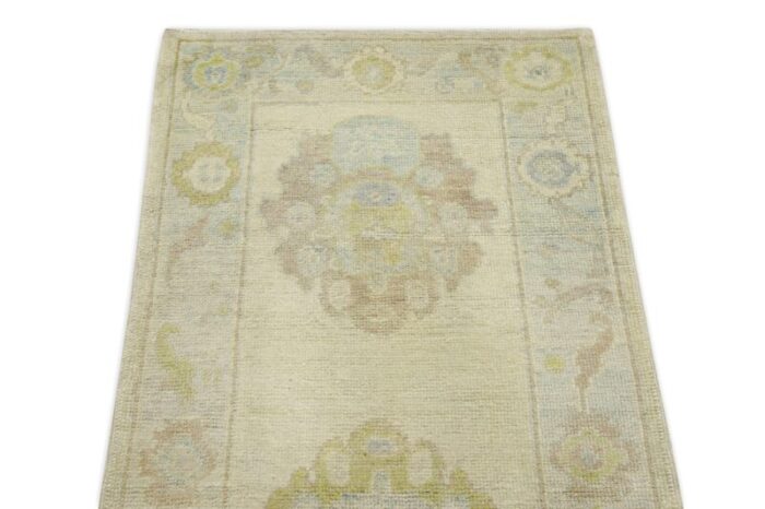 early 21st century cream multicolor floral design handwoven wool turkish oushak runner rug 28 x 10 handmade oriental rug 2430