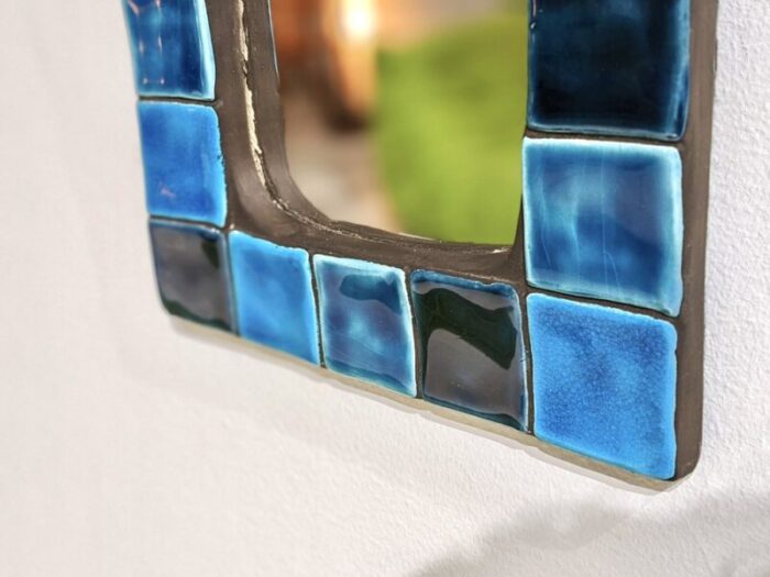 enamelled ceramic wall mirror by mithe espelt 3