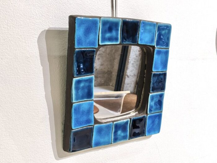 enamelled ceramic wall mirror by mithe espelt 6