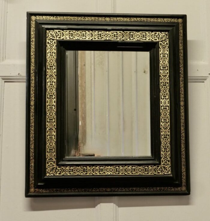 french empire gilt brass and black lacquer wall mirror 1