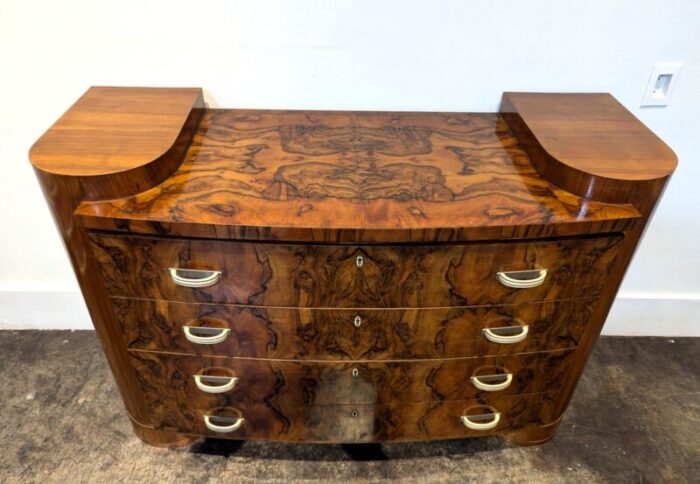 italian art deco chest of drawers with bookmarked walnut burl finish and bakelite pulls 9263