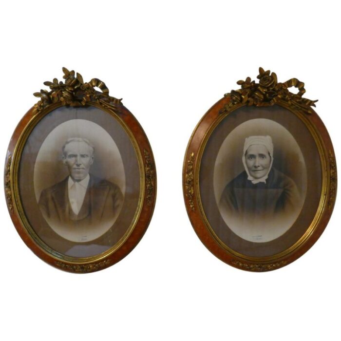 large portrait photographs in oval ormolu frames 1890 set of 2 1