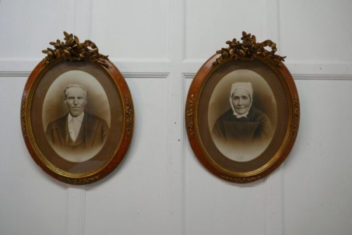 large portrait photographs in oval ormolu frames 1890 set of 2 8