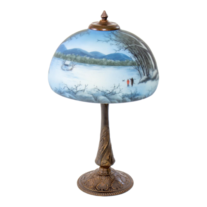 late 19th century cast iron table lamp with wintery blue reverse painted glass shade 8703