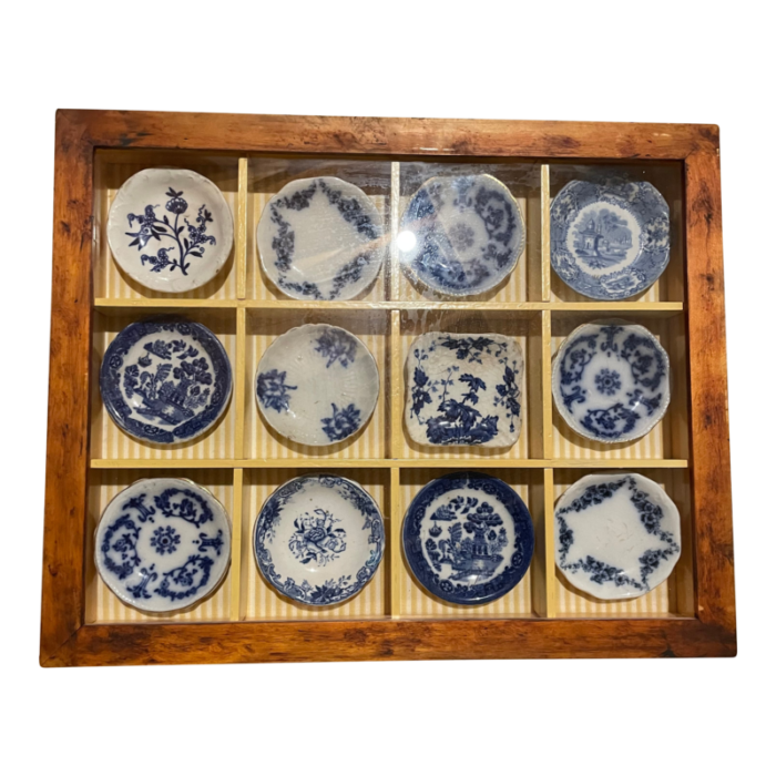 late 19th century staffordshire butter pats in shadow box frame 3664