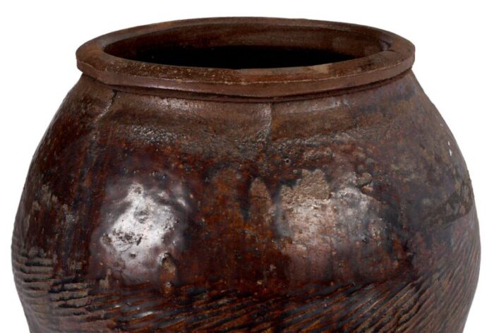 late 20th century glazed terra cotta jar with scored texture 7626