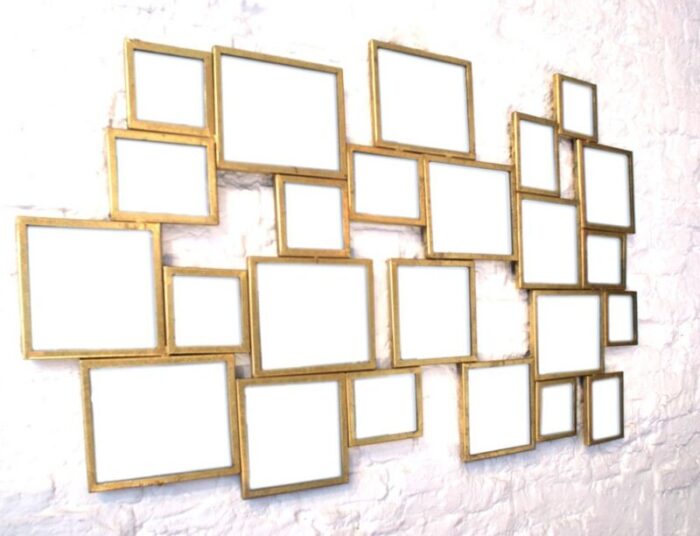 metal gold leaf mirror in the style of marc du plantier 1