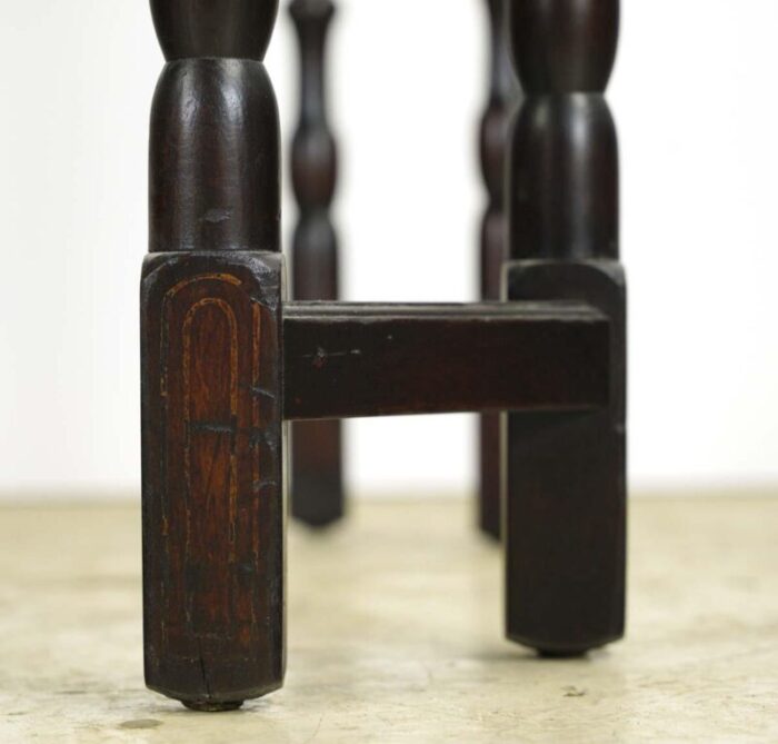 mid 20th century dark stained mahogany spindle legs dining table 1948