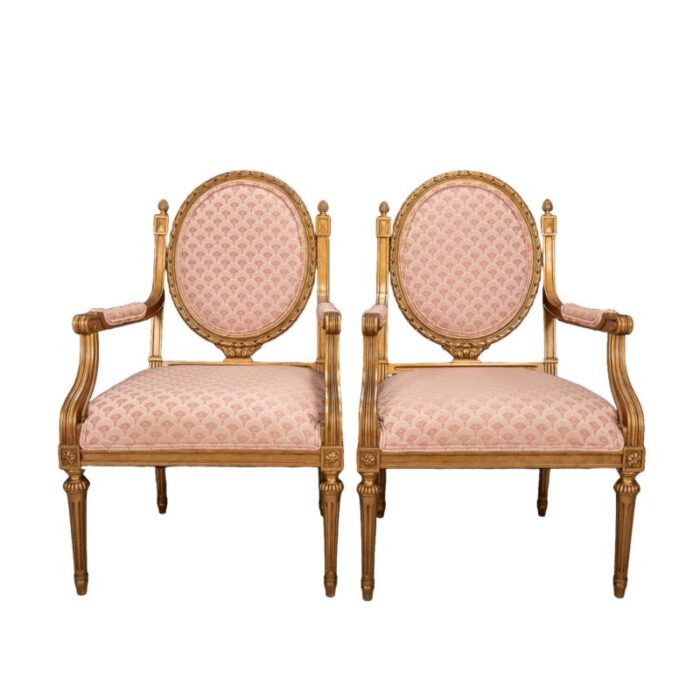 mid 20th century pair of french louis xvi style cameo back fauteuil armchairs in gilt and pink 3739