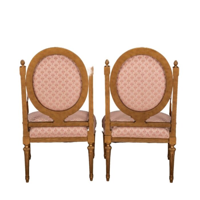 mid 20th century pair of french louis xvi style cameo back fauteuil armchairs in gilt and pink 3896