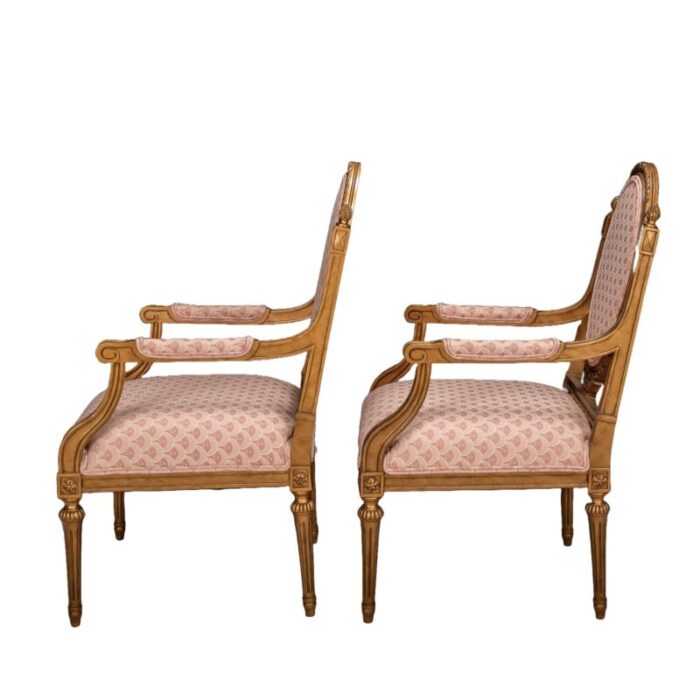 mid 20th century pair of french louis xvi style cameo back fauteuil armchairs in gilt and pink 7668