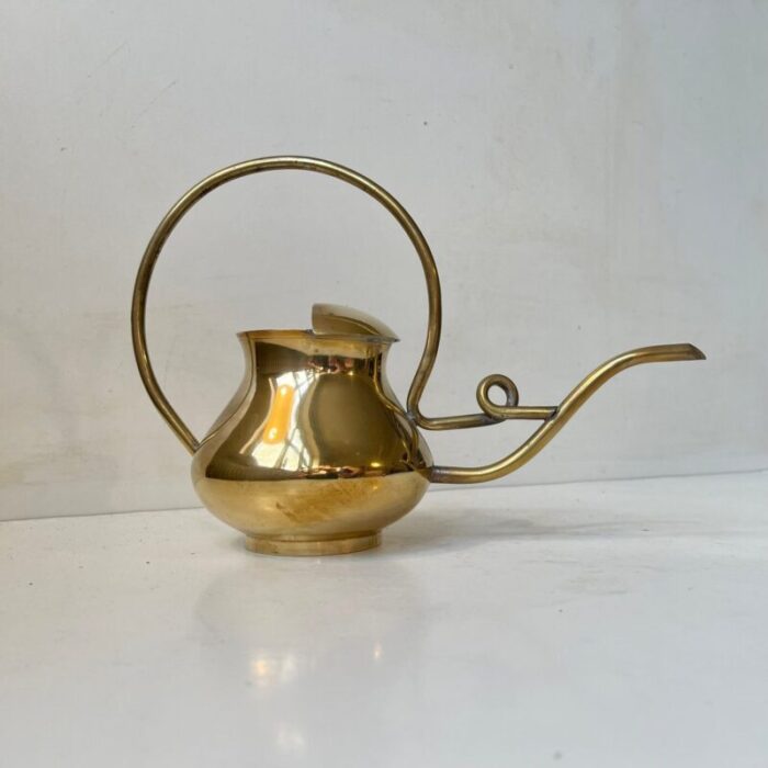 mid century scandinavian watering can in brass 1