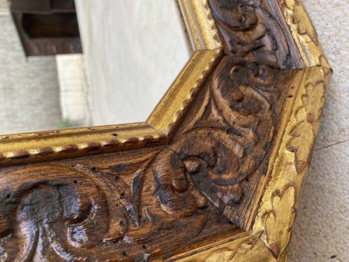 octogonal wall mirror with carved gold wooden frame 1940s 11