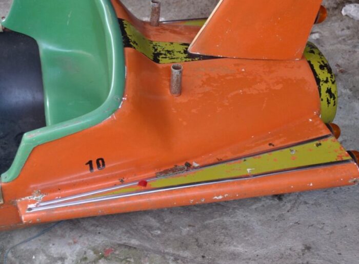 orange and green carousel plane 1960s 13