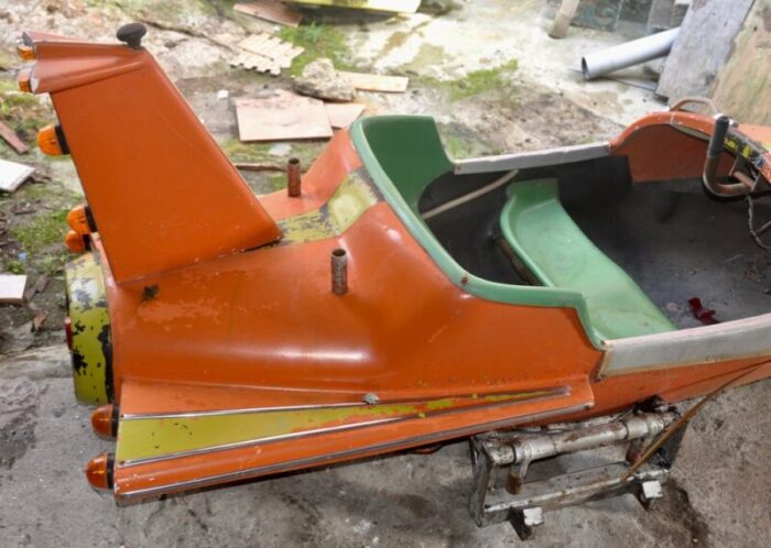 orange and green carousel plane 1960s 2