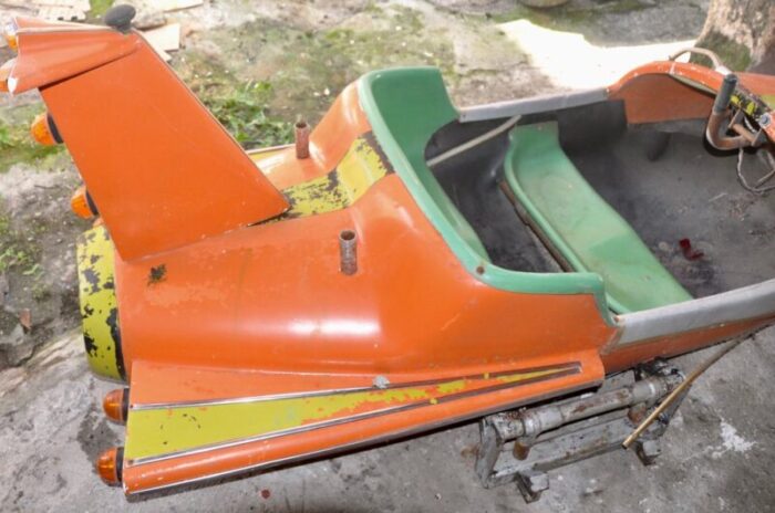 orange and green carousel plane 1960s 22