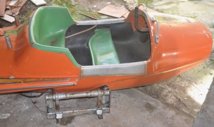 orange and green carousel plane 1960s 4