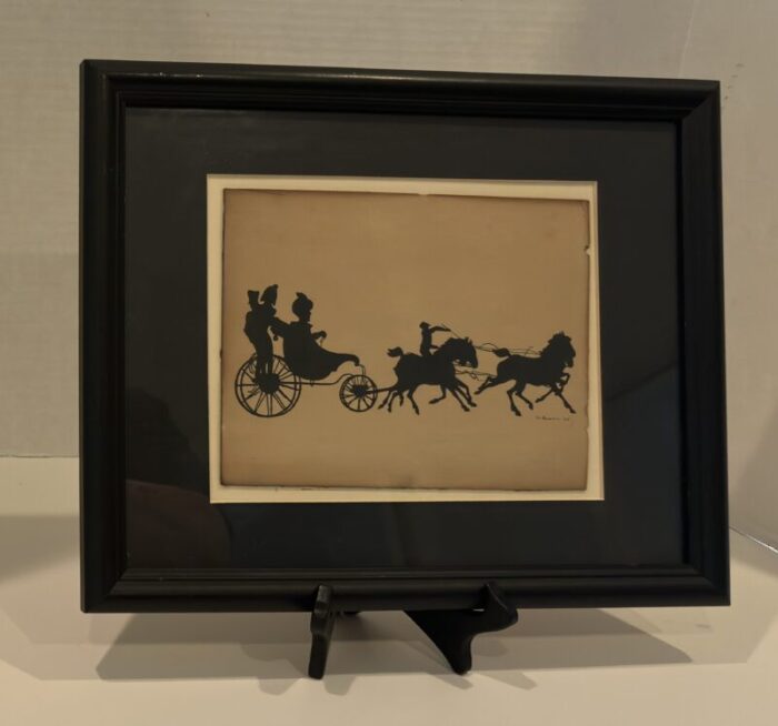 pair of 1960s vintage silhouette art pieces on board carriage and sled 3071