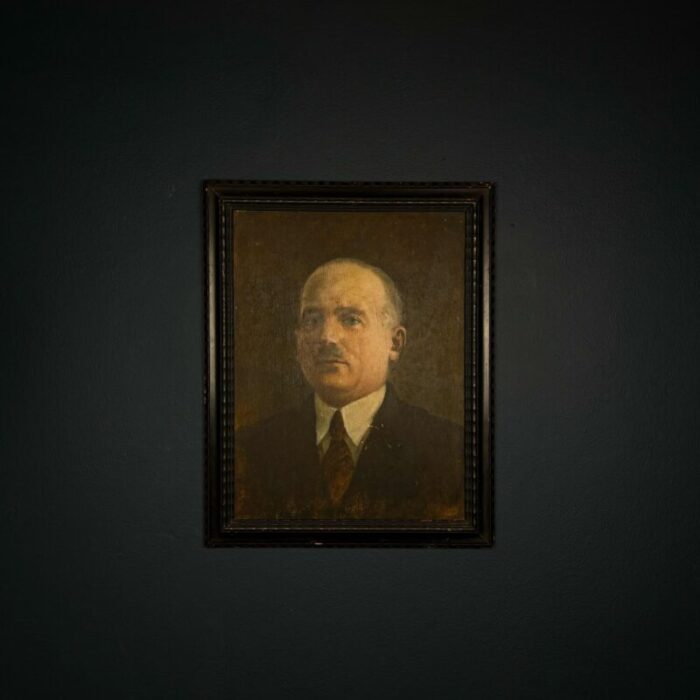 portrait man in a suit late 19th century oil on plywood 4456