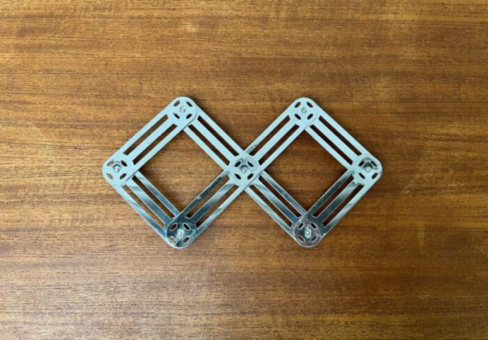 postmodern german metal extendable trivet coaster from zack 0134