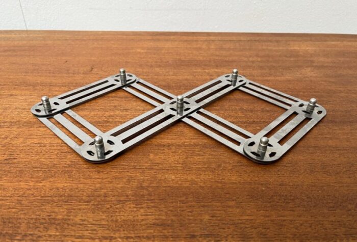 postmodern german metal extendable trivet coaster from zack 5236