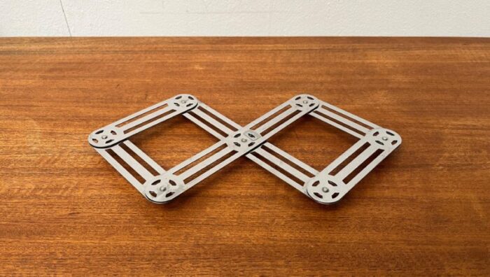 postmodern german metal extendable trivet coaster from zack 9692