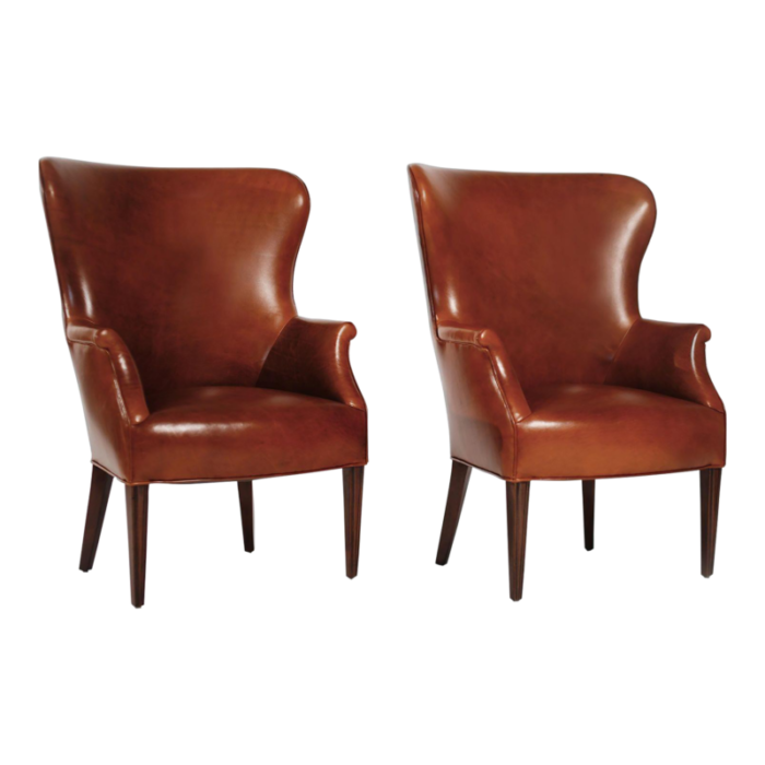 set of wingback club chairs in cognac leather c 1950s 3632