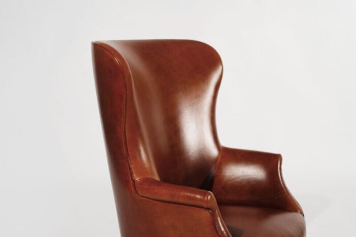 set of wingback club chairs in cognac leather c 1950s 9951