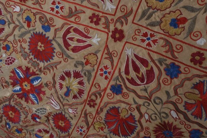 suzani embroidered and quilted silk table runner with tulip motif 7