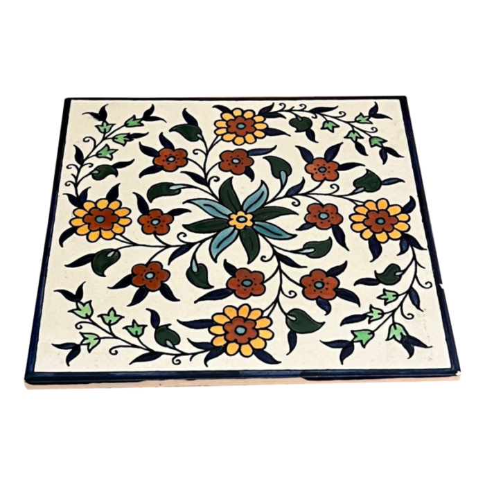 vintage ceramic tile depicting a hand painted floral design 5795