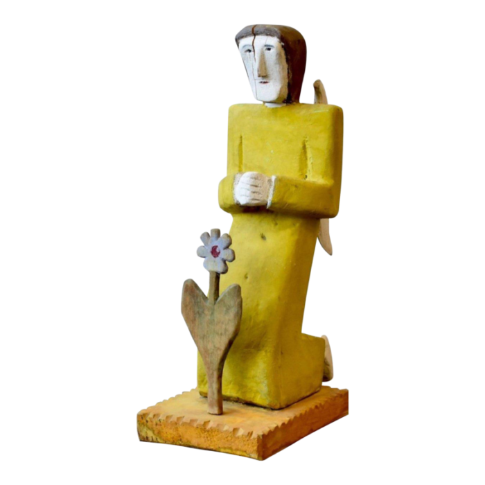 vintage folk art carved painted wood figure praying to flower by zenon miczoek circa 1990s 2612