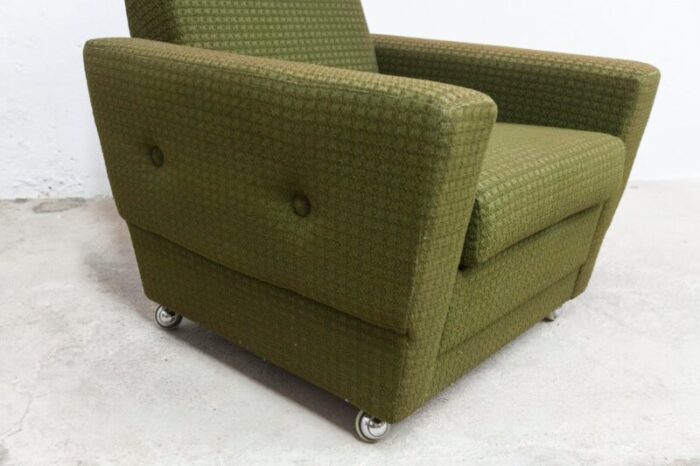 vintage green armchair on casters 1960s 1036