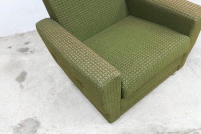 vintage green armchair on casters 1960s 1975