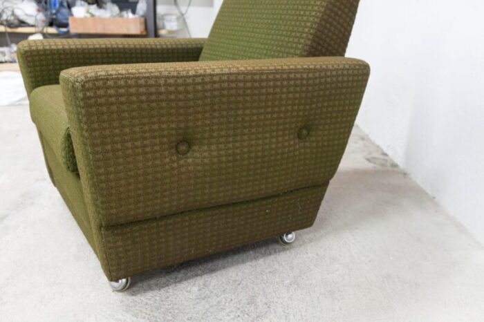 vintage green armchair on casters 1960s 4043